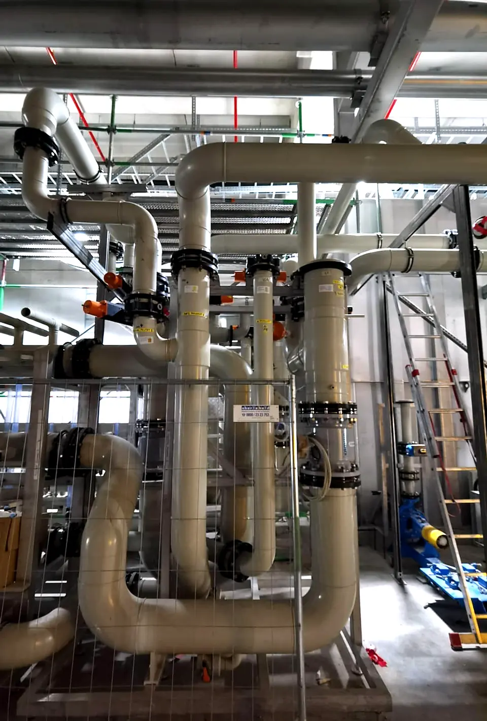 Large-diameter pipelines next to tanks