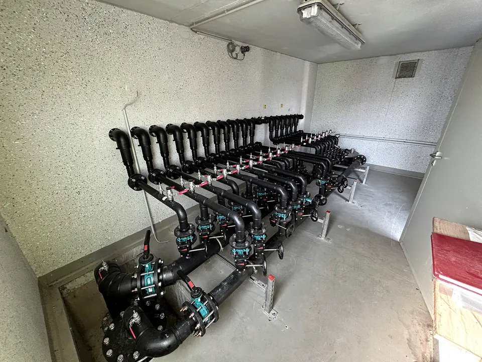 PE pipe manifold in a plant room