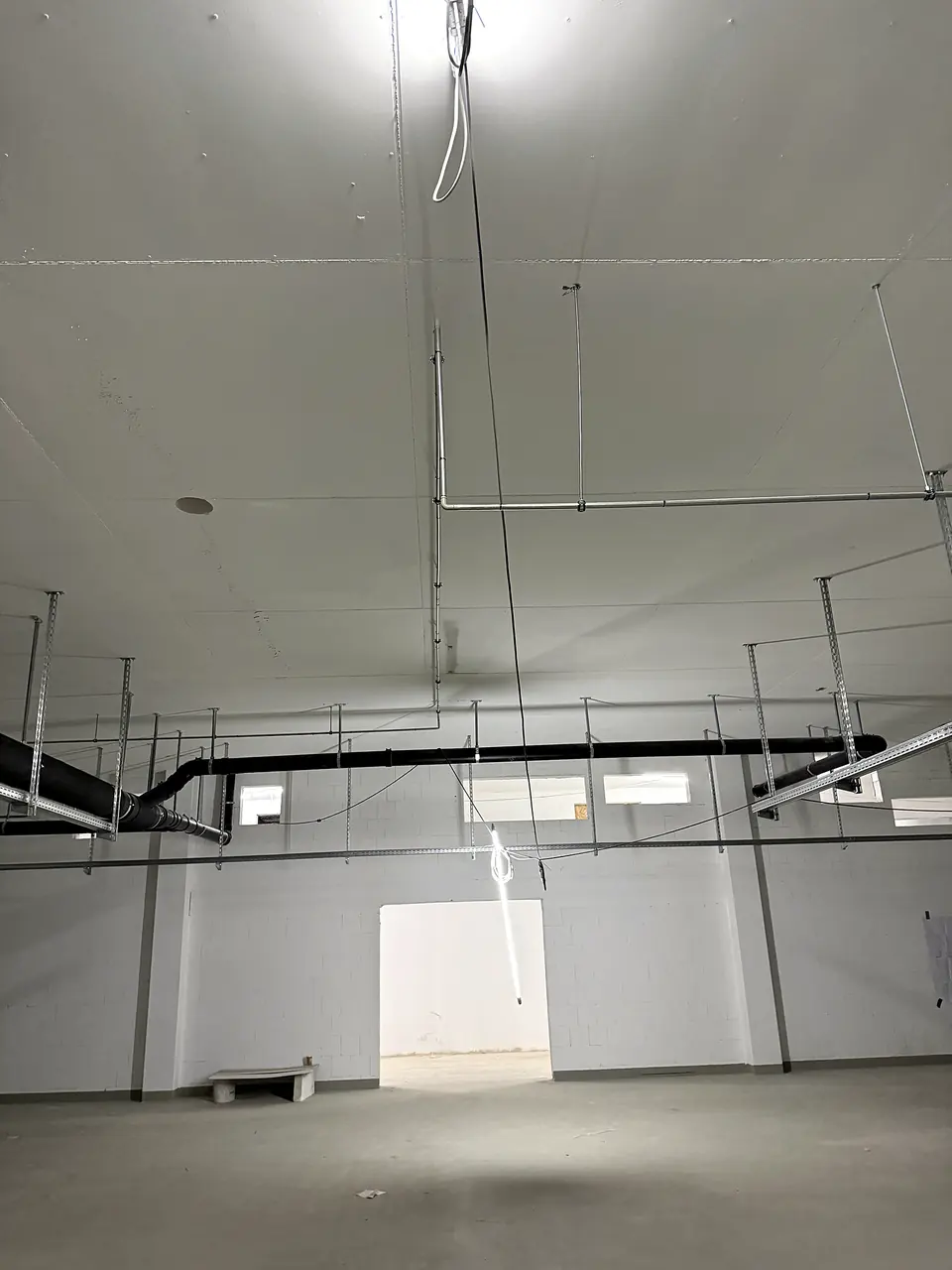 Pipeline below the ceiling of a new hall