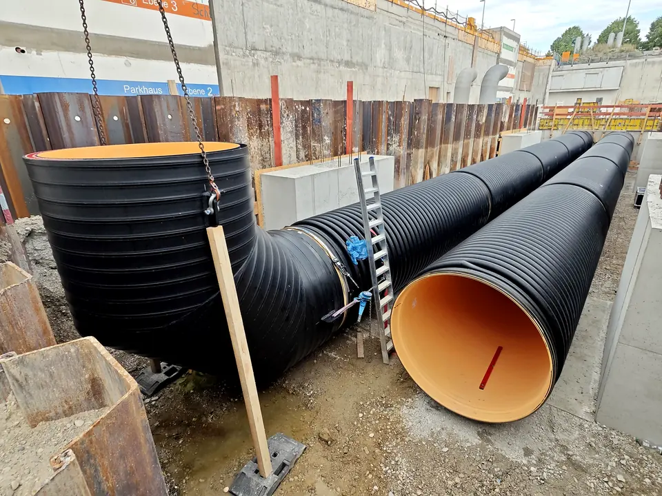 Large-diameter pipes on a construction site